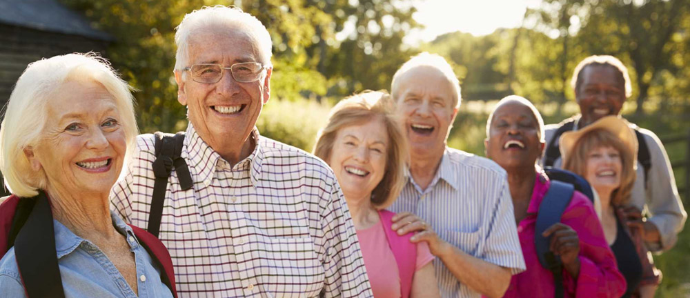 Group of happy older friends outside