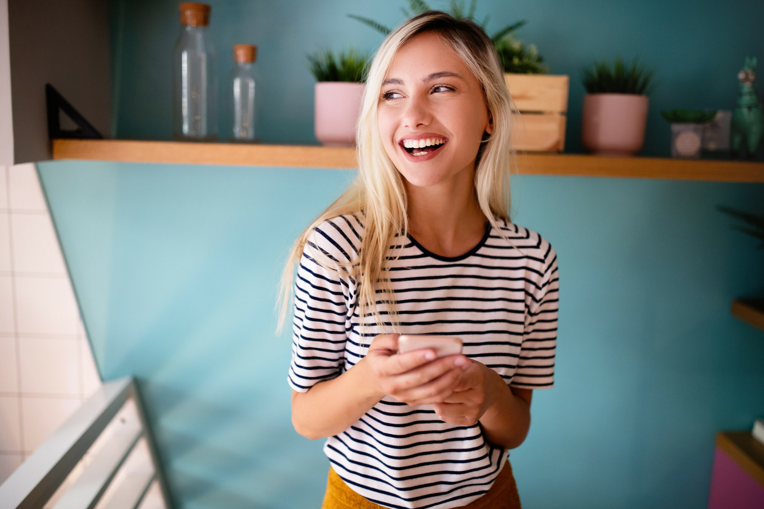 Happy woman with cellphone